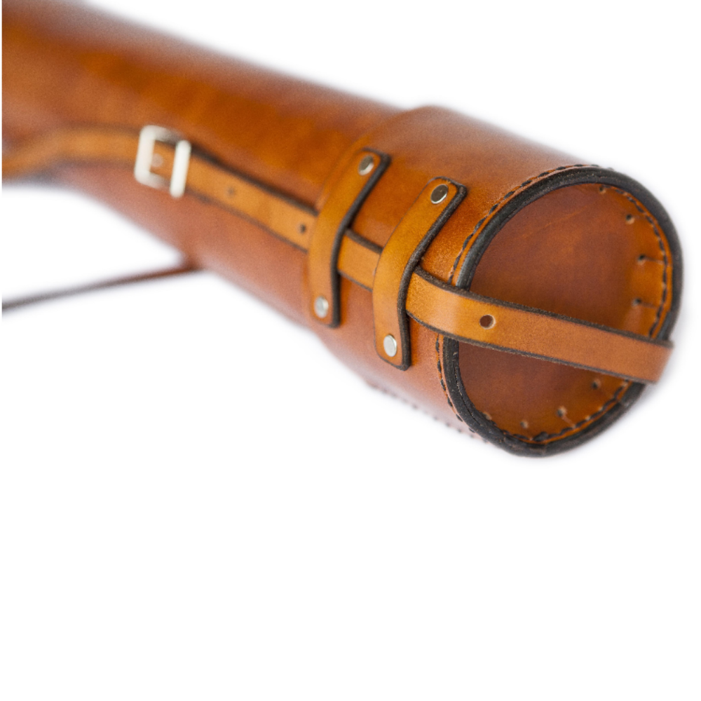 Close-up view of honey leather variant of the Blueprint Tube showing the silver look hardware and removable cap on plain white background